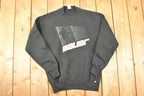 Vintage 1990s Russell Athletic Bauer Hockey Graphic Print Crewneck Sweatshirt Mens M