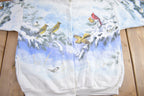Vintage 1990s Artisans Winter Cardinals Theme All Over Print Button Up Sweater
