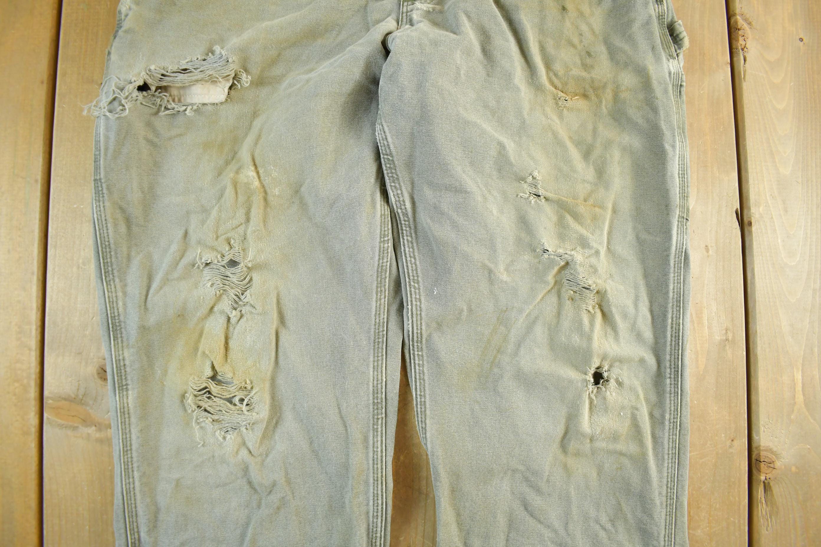 Vintage 1990s Carhartt Distressed Sun Faded Denim Work Jeans Adult 37 x 30