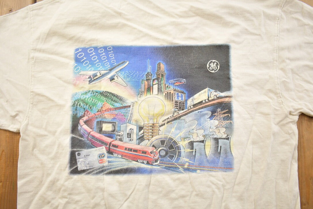Vintage 1990s General Electric Metropolis Themed Graphic T Shirt