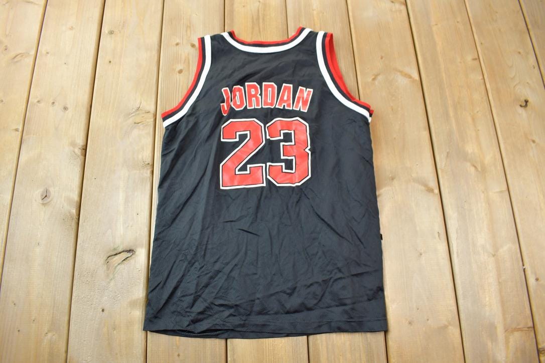 Vintage 1990s Michael Jordan Chicago Bulls NBA Champion Youth Sized Jersey