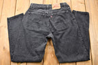 Vintage Early 1990s Levi's 550 Relaxed Tapered Faded Black Jeans