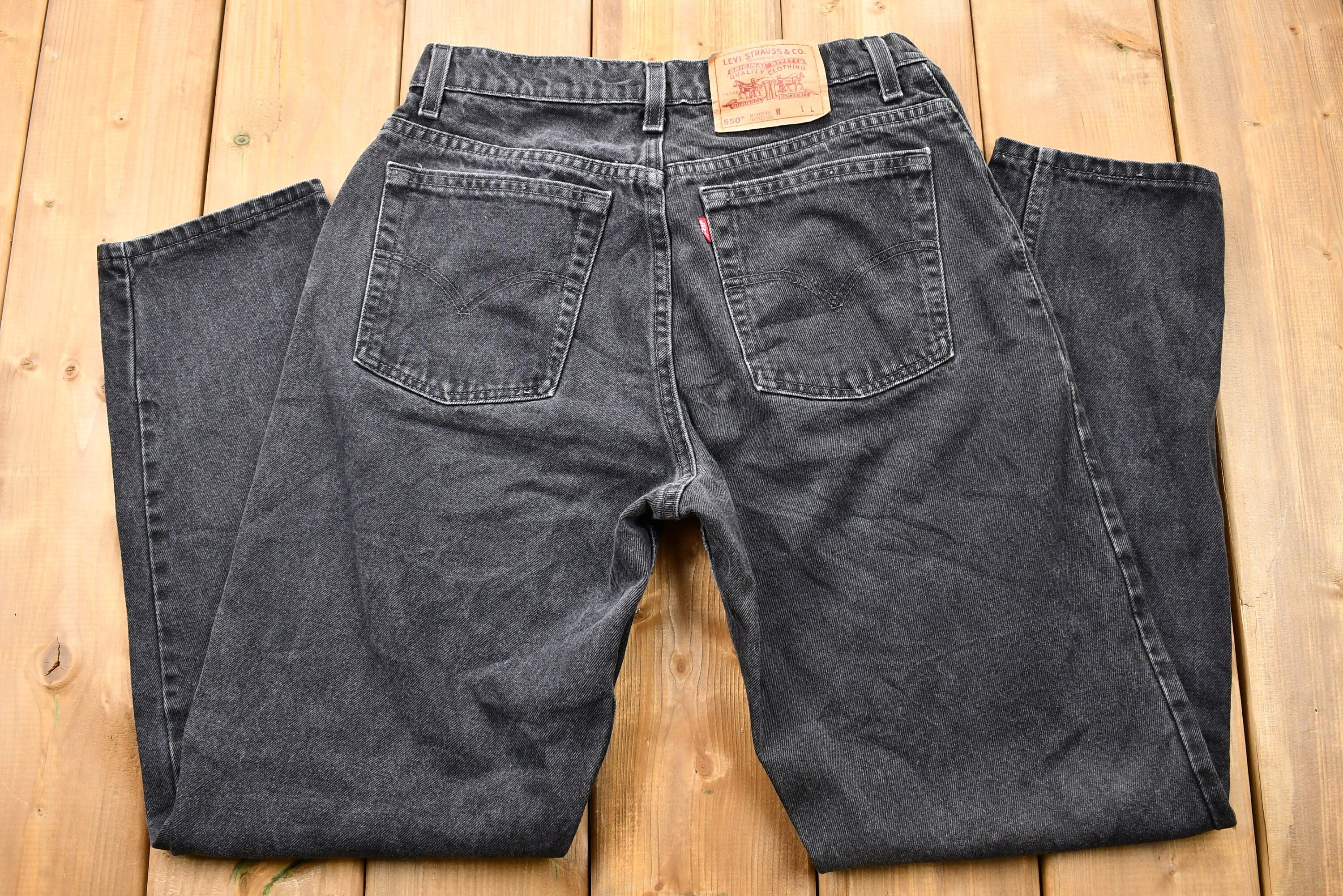 Vintage Early 1990s Levi's 550 Relaxed Tapered Faded Black Jeans
