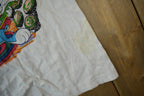 Vintage 1990s Tiny Tunes Destination Alps All Over Print Graphic T-Shirt  Warner Bros  Looney Tunes  3XL  CUT NECK