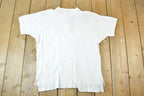 Vintage 1990s Nike Embroidered Quarter Button Polo Shirt