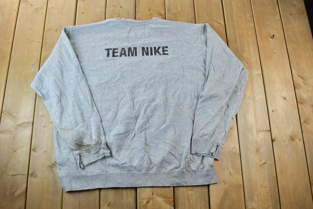 Vintage 1990s Team Nike Embroidered Mini Swoosh Crewneck Sweatshirt