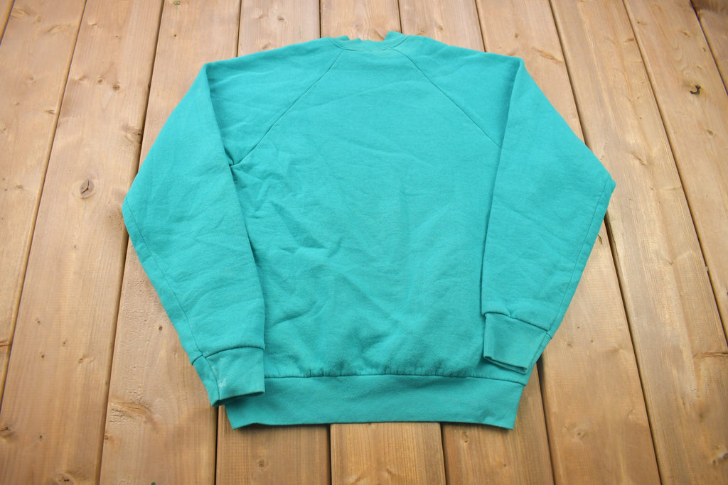Vintage 1990s Fruit of the Loom Blank Raglan Crewneck Sweatshirt