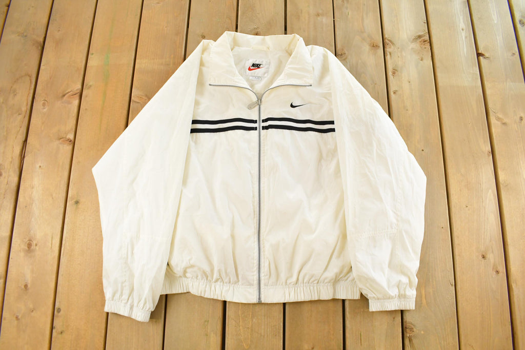 Vintage 1990s Nike Mini Swoosh Windbreaker Jacket Men's Large