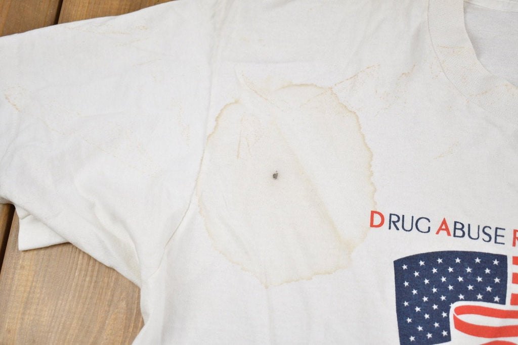 Vintage 1990s DARE America Teaching Kids To Never Take Drugs Graphic T-Shirt