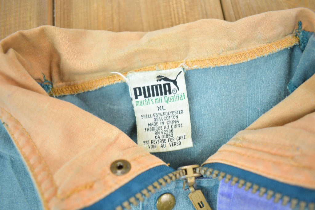 Vintage 1990s Puma Embroidered Sun Faded Windbreaker Jacket Size XL