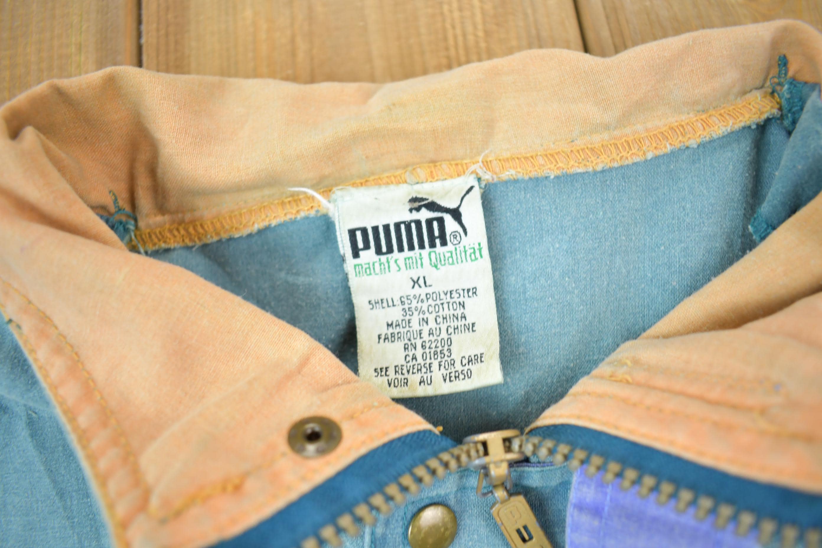 Vintage 1990s Puma Embroidered Sun Faded Windbreaker Jacket Size XL