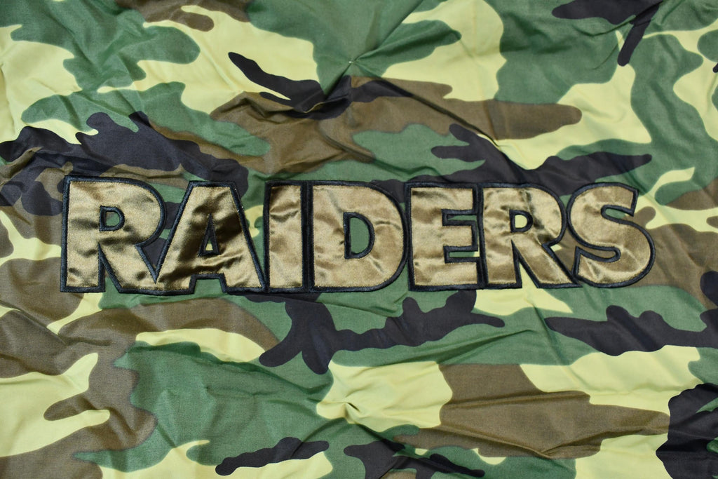 Vintage 1990s Camo Raiders NFL Football Hooded Puffer Jacket