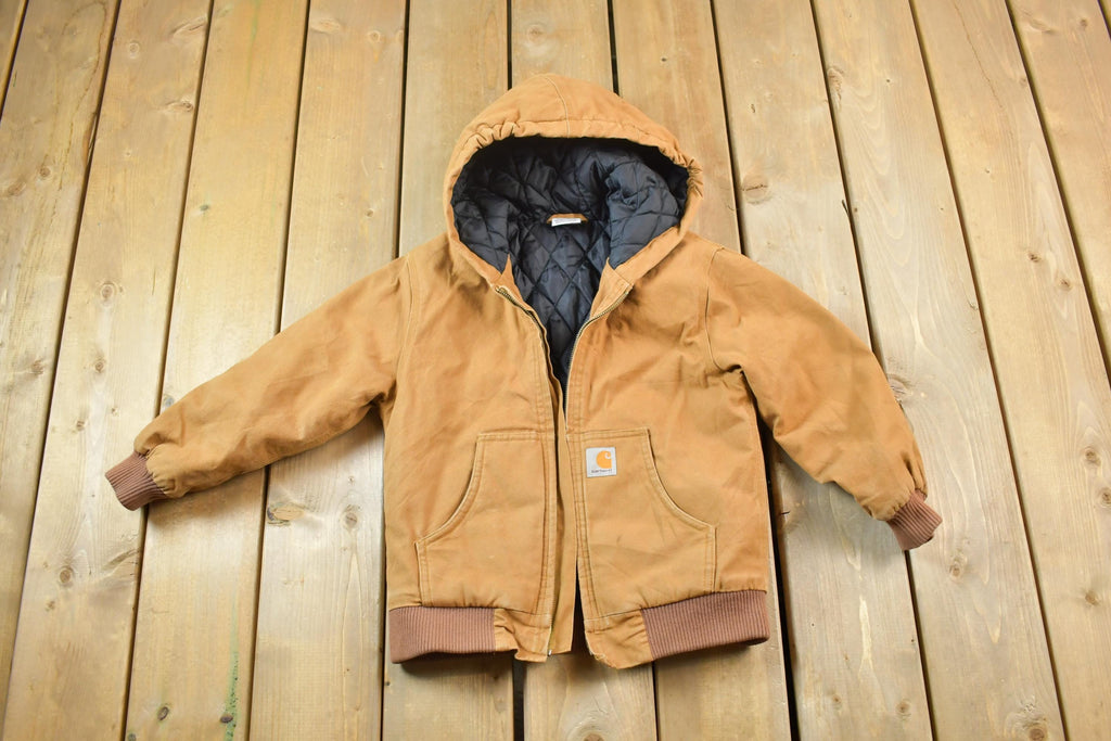 Vintage 1990s Distressed Carhartt Youth Chore Jacket Made In USA