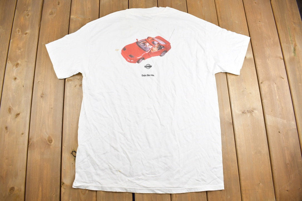 Vintage 1990s Nissan GI Joe Barbie Graphic T-Shirt