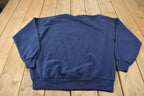 Vintage 1990s Peace On Earth Embroidered Crewneck Sweatshirt Made In USA