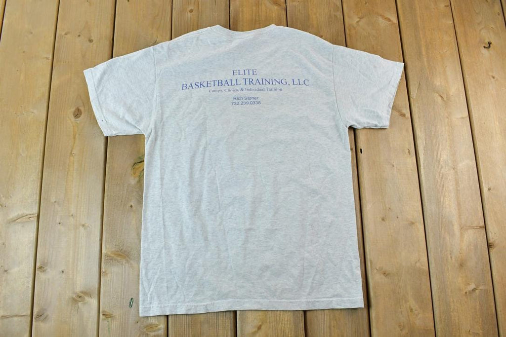 Vintage 1990s Metuchen University Basketball Collegiate T-Shirt