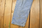 Vintage 1990s Levi's 550 Relaxed Fit Light Wash Jeans Size 34 x 30