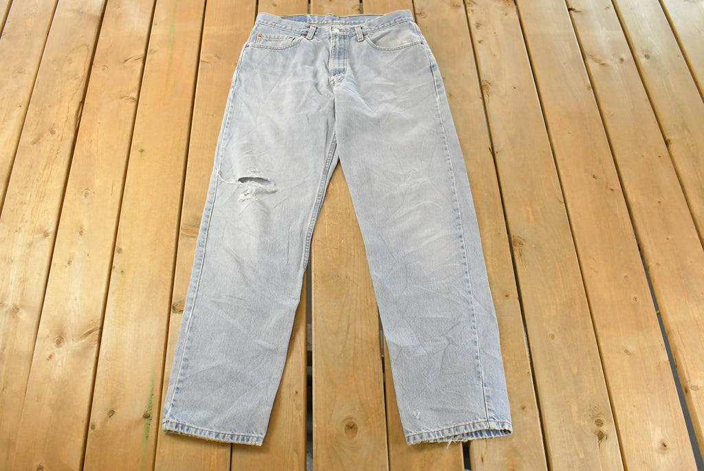 Vintage 1990s Levi's Distressed 550 Relaxed Fit Denim Jeans Men's 33 x 33 / 90s Levi's / Blown Out Sun Faded Jeans