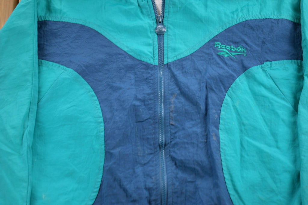 Vintage 1990s Reebok Embroidered Windbreaker Jacket