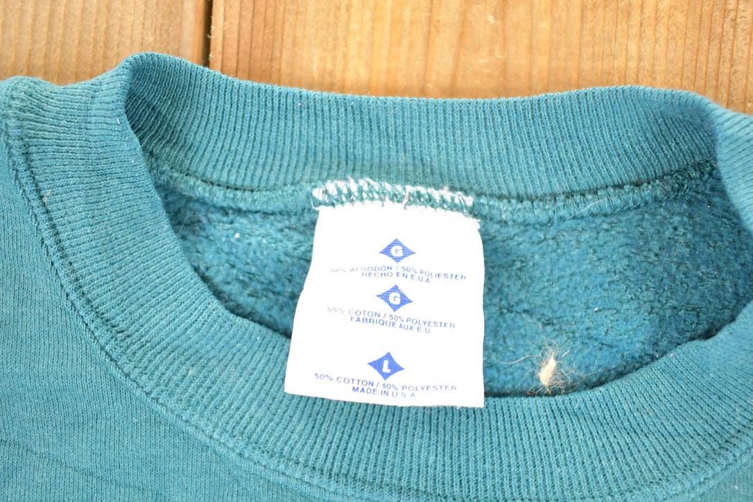 Vintage 1990s Minnesota Loons Crewneck Sweatshirt Men's L / Made In USA / 90s Embroidered Destination Crew Neck