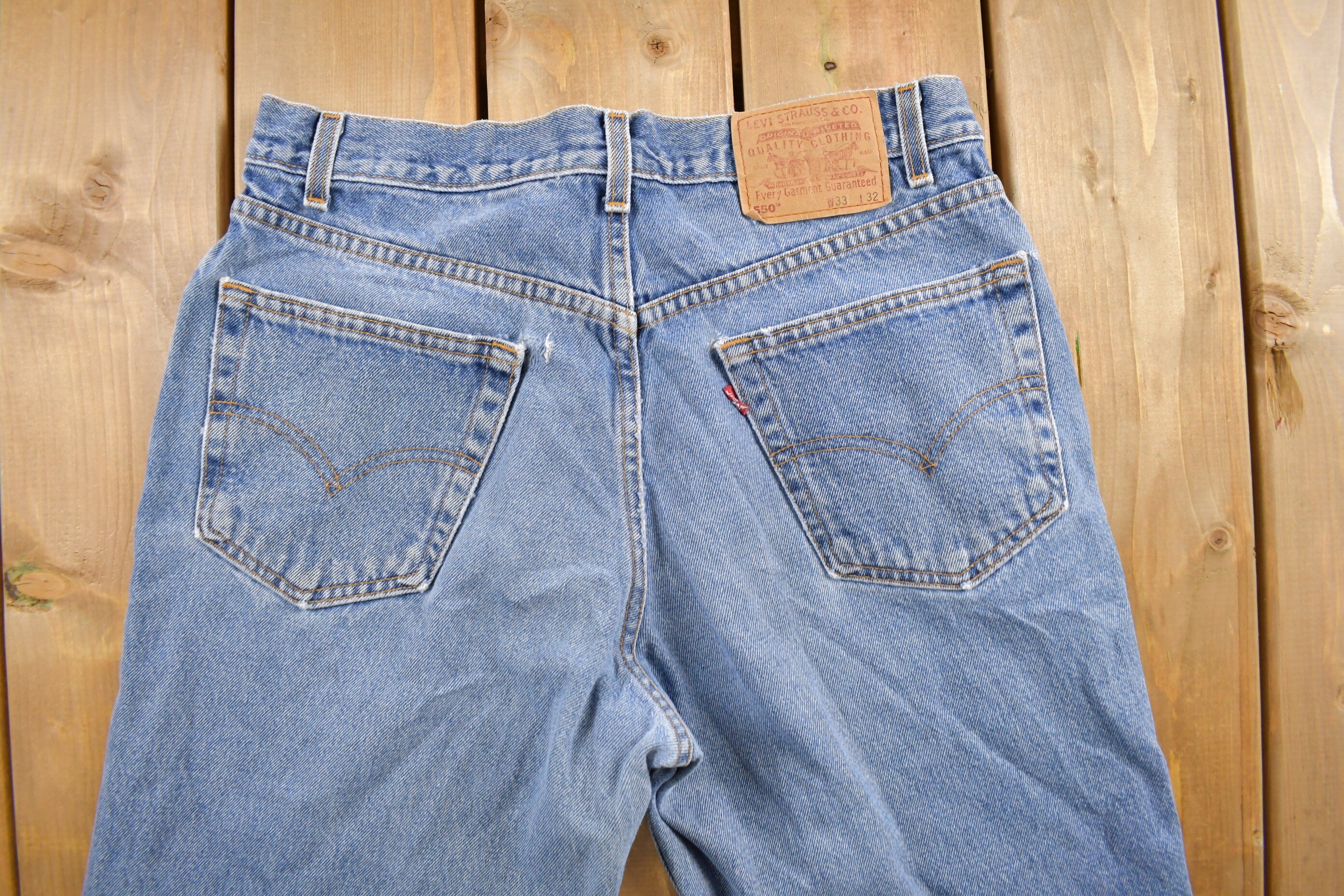 Vintage 1990s Levi's 550 Medium Wash Denim Jeans Size 34 x 31