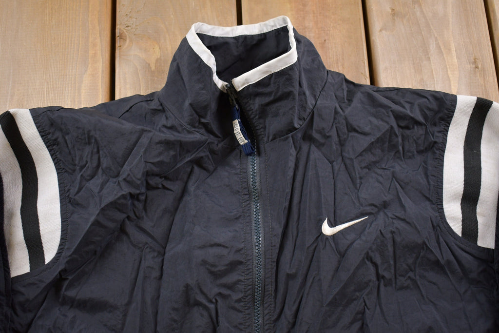 Vintage 1990s Kids Nike Swoosh Embroidered Windbreaker Jacket