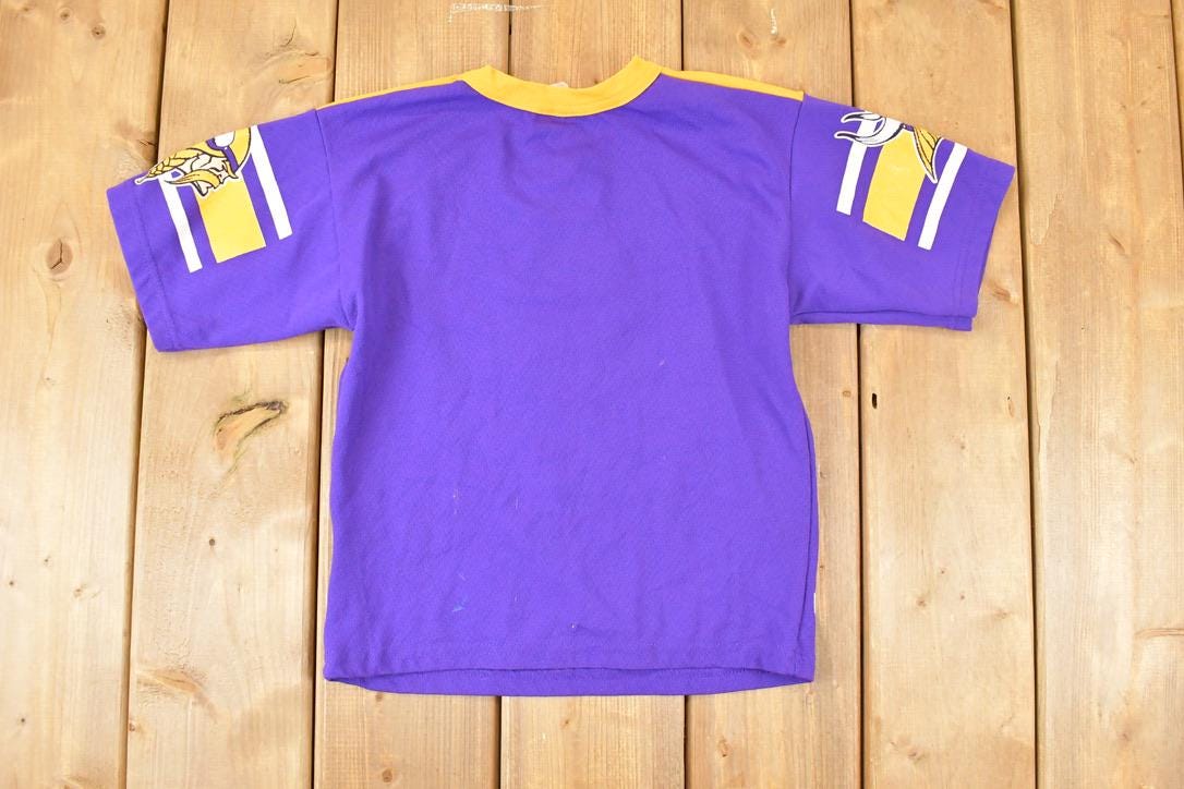 Vintage 1990s Minnesota Vikings AOP NFL T-Shirt Youth S