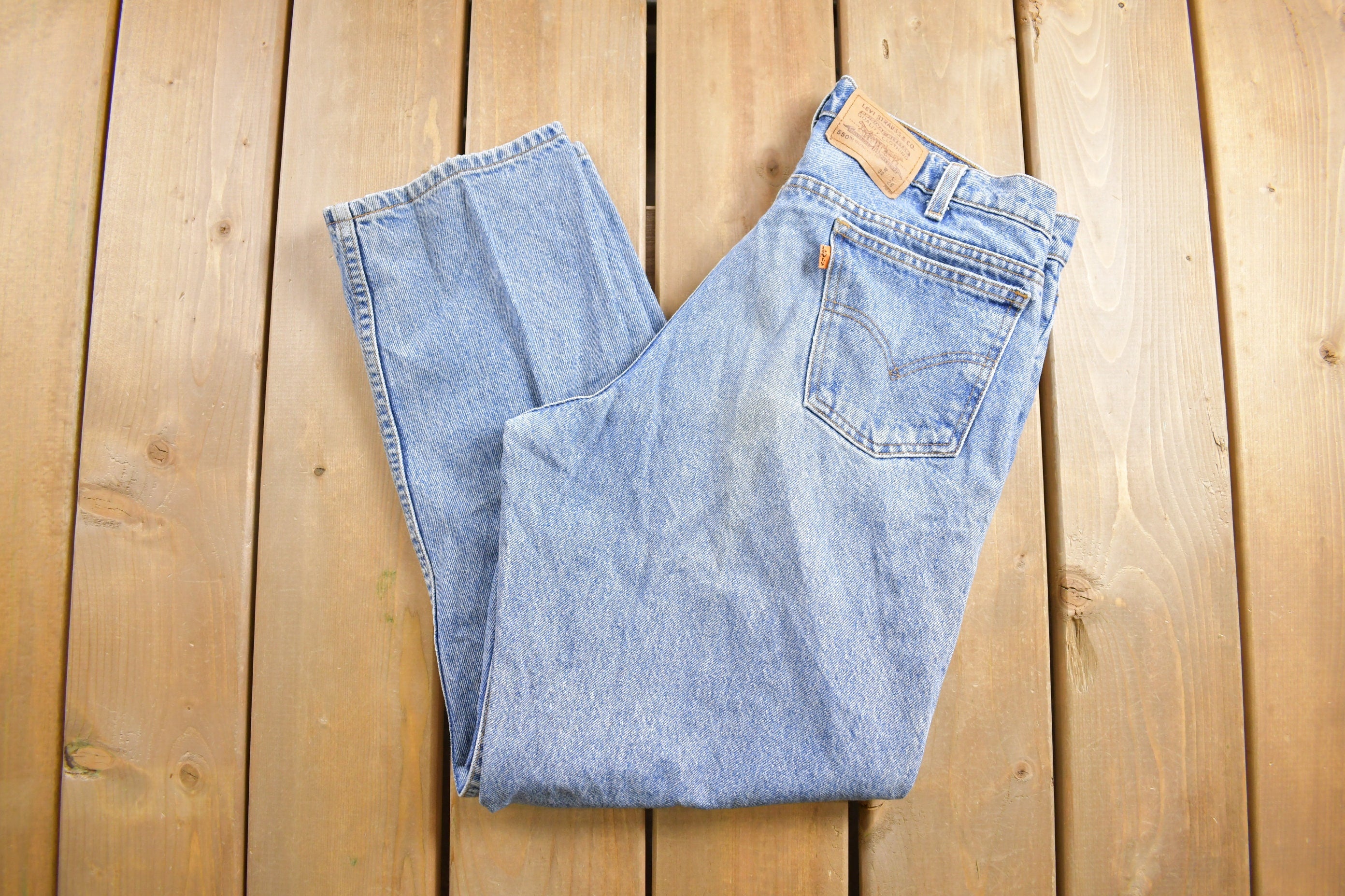 Vintage 1990s Levi's 550 Orange Tab Jeans Size 31 x 28.5