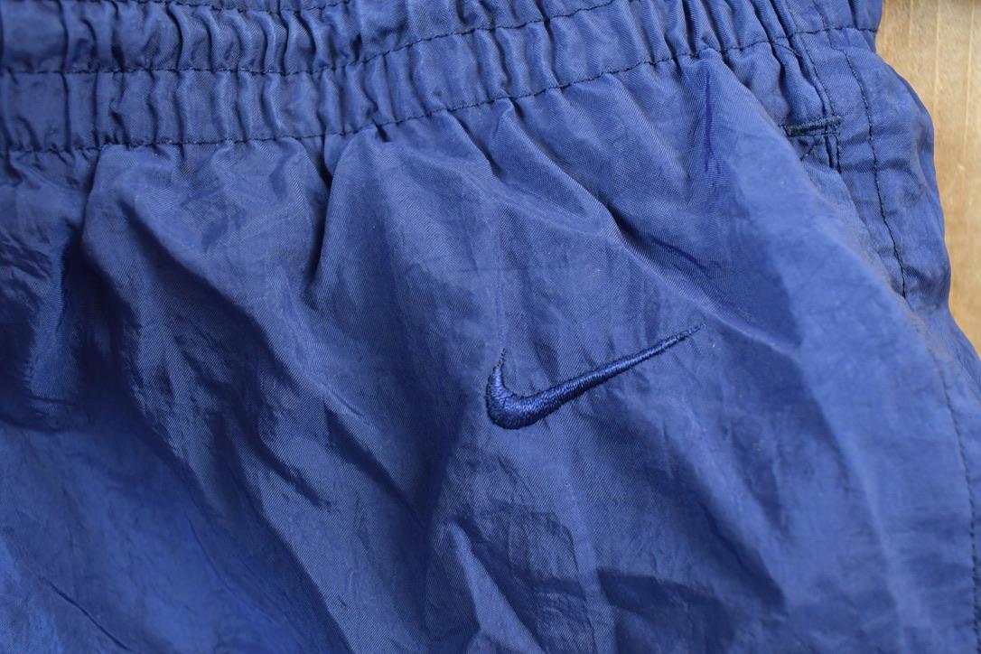 Vintage 1990s Nike Quarter Tearaway Mini Swoosh Splash Athletic Pants Size XL