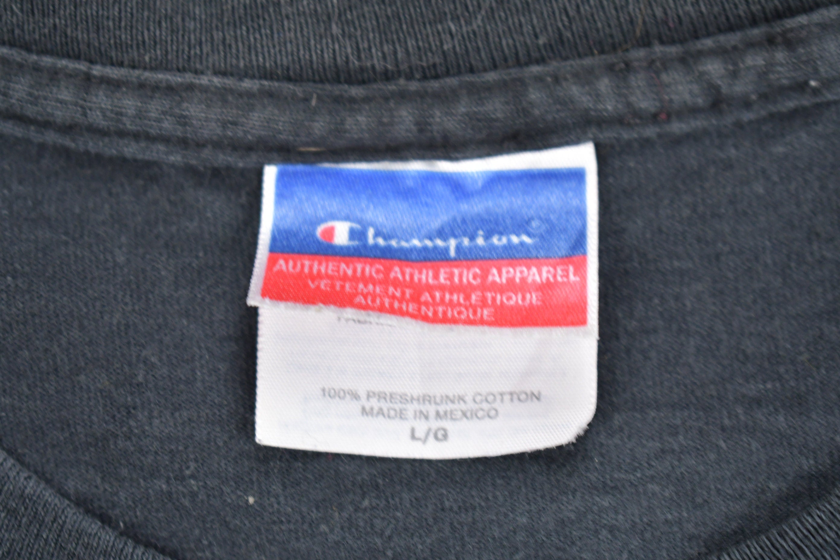Vintage 1990s Champion Athletics Graphic T Shirt