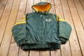 Vintage 1990s Green Bay Packers NFL Logo7 Puffer Jacket