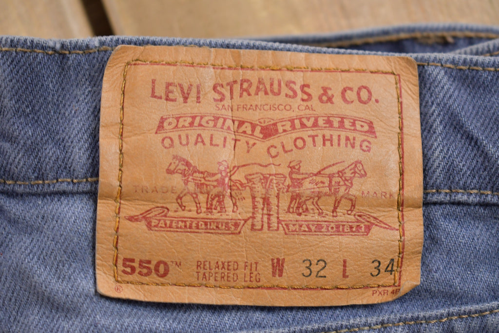 Vintage 1990s Levi's 550 Red Tab Denim Jeans Size 30 x 31