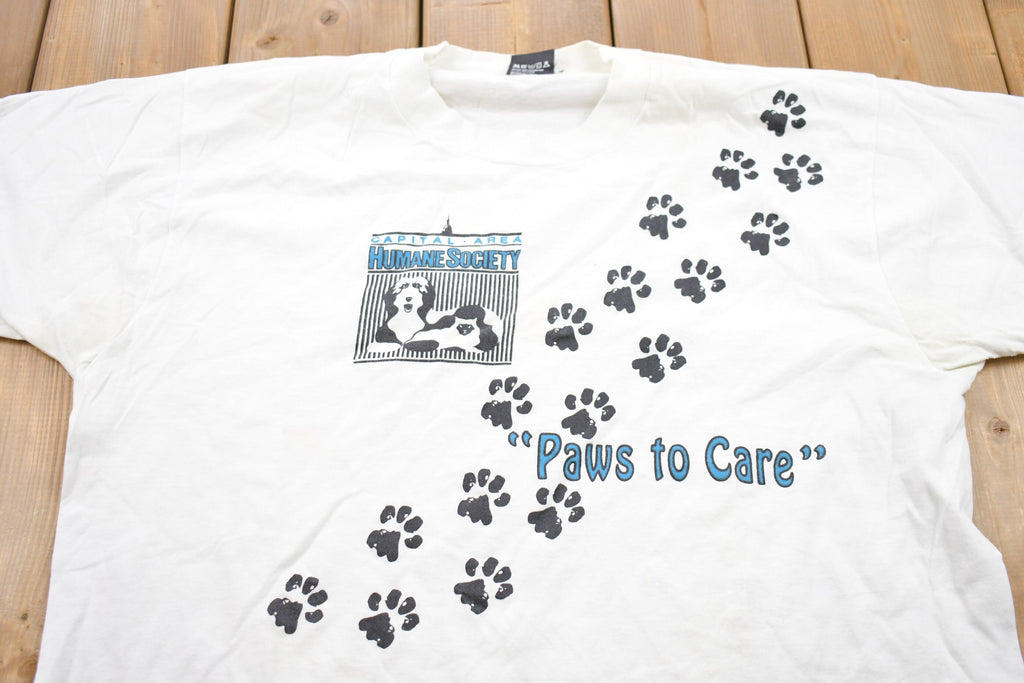 Vintage 1990s Paws To Care Humane Society Graphic T-Shirt