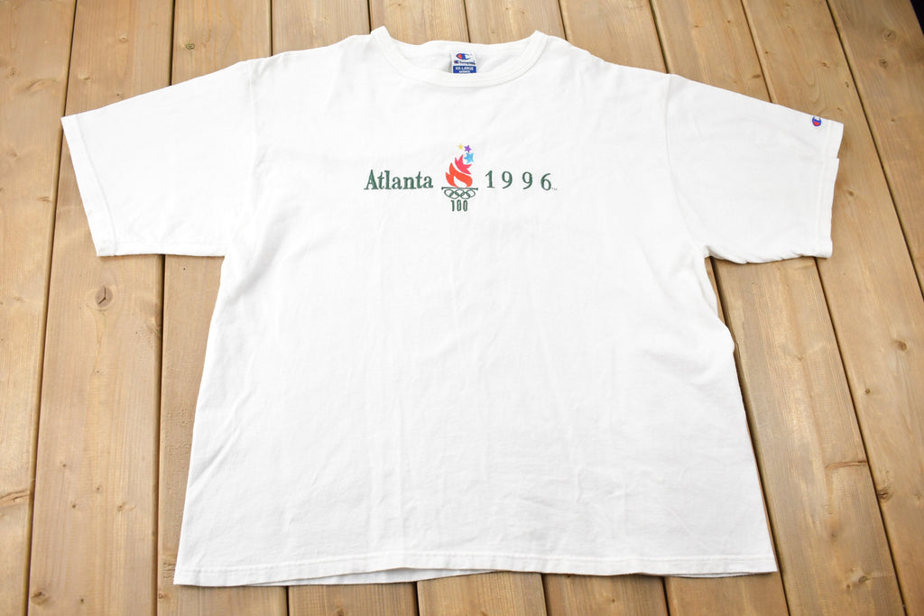 Vintage 1996 Atlanta Olympics Champion Embroidered Graphic T Shirt
