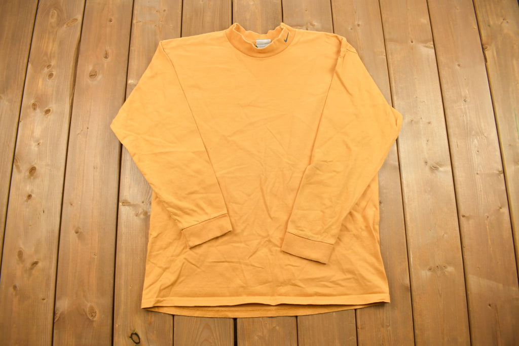 Vintage 1990s Nike Embroidered Mini Swoosh Mockneck Sweatshirt