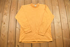 Vintage 1990s Nike Embroidered Mini Swoosh Mockneck Sweatshirt
