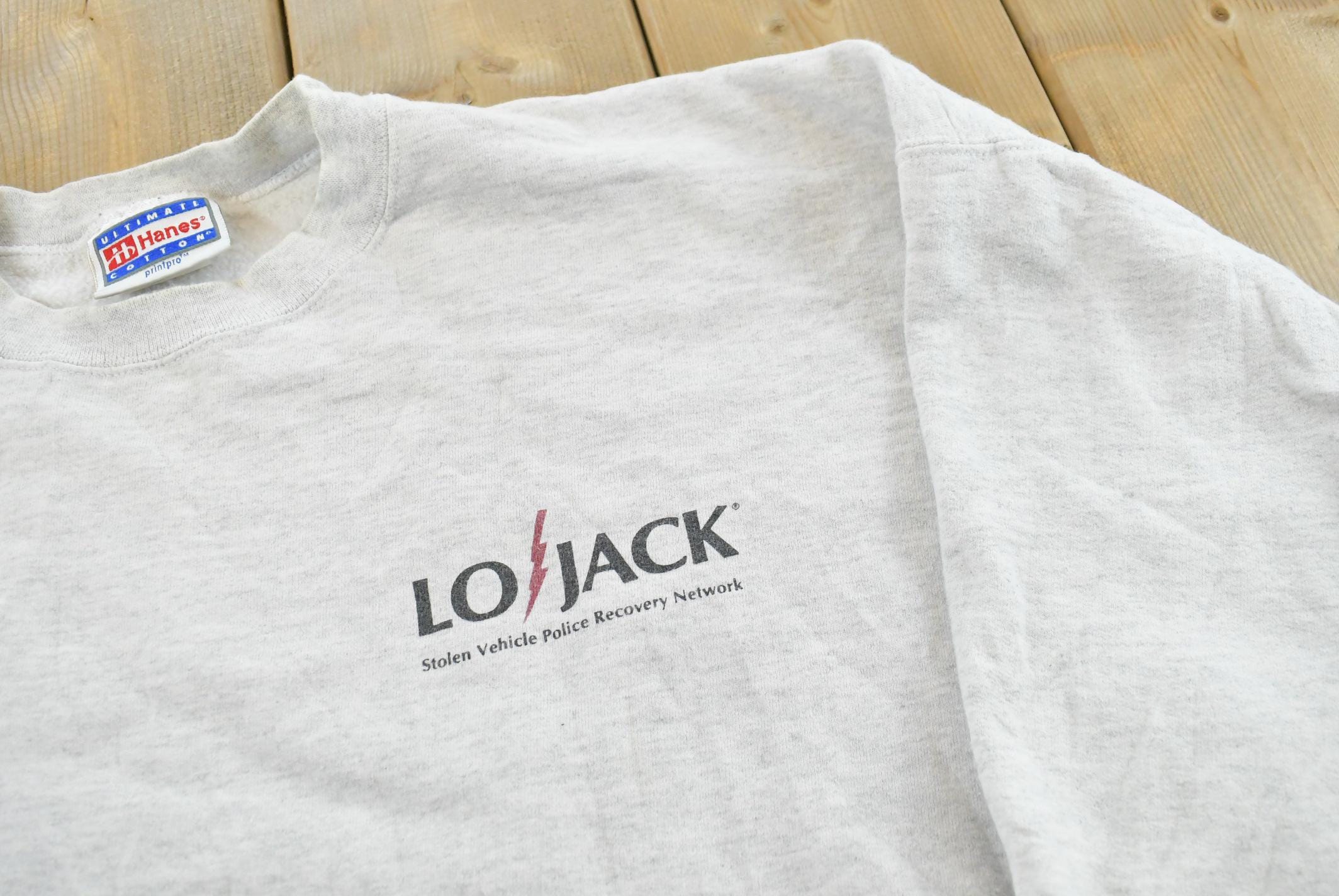 Vintage 1990s LoJack Stolen Vehicle Prevention Promotional Sweatshirt Mens L / Hanes / 90s Sweater / Theft / Crime