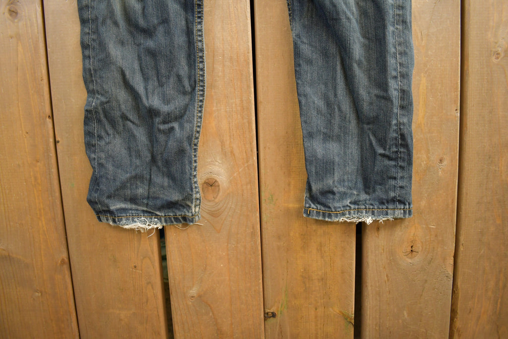 Vintage 1990s Levi's 521 Distressed Jeans Size 29x32