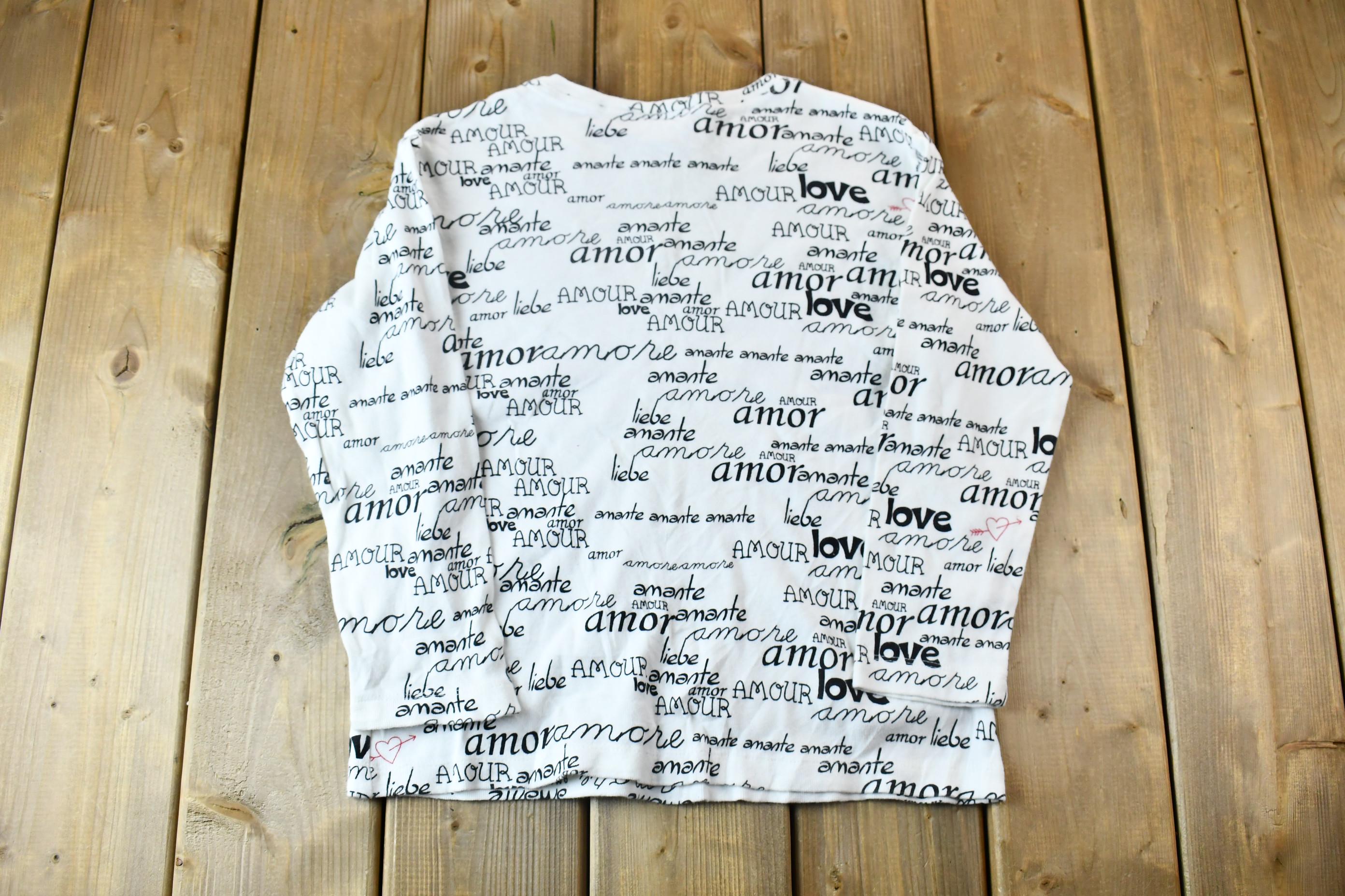 Vintage 1990s Chico's Design Ribbed Long Sleeve All-Over-Print Languages of Love Graphic T-Shirt