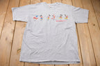Vintage 2000s Walt Disney World Mickey Mouse Over the Years T-Shirt