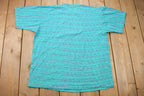 Vintage 1991 Ocean Pacific All Over Print Graphic T Shirt