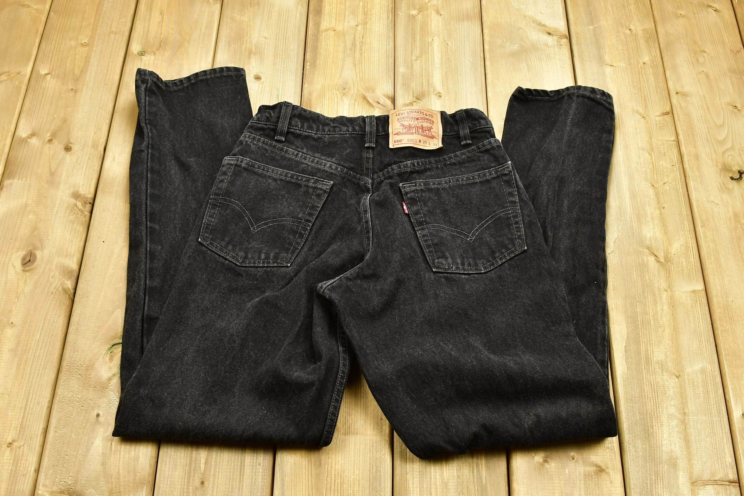 Vintage 1990s Levi's 550 Red Tab Jeans Size 29 x 34
