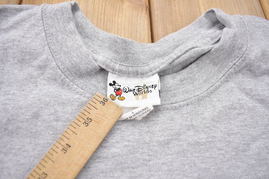Vintage 2000s Walt Disney World Mickey Mouse Over the Years T-Shirt