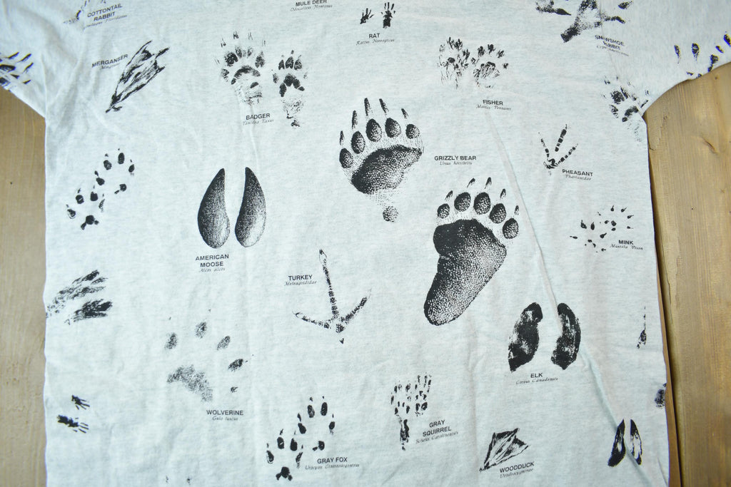 Vintage 1990s Animal Tracks All Over Print Graphic T-Shirt