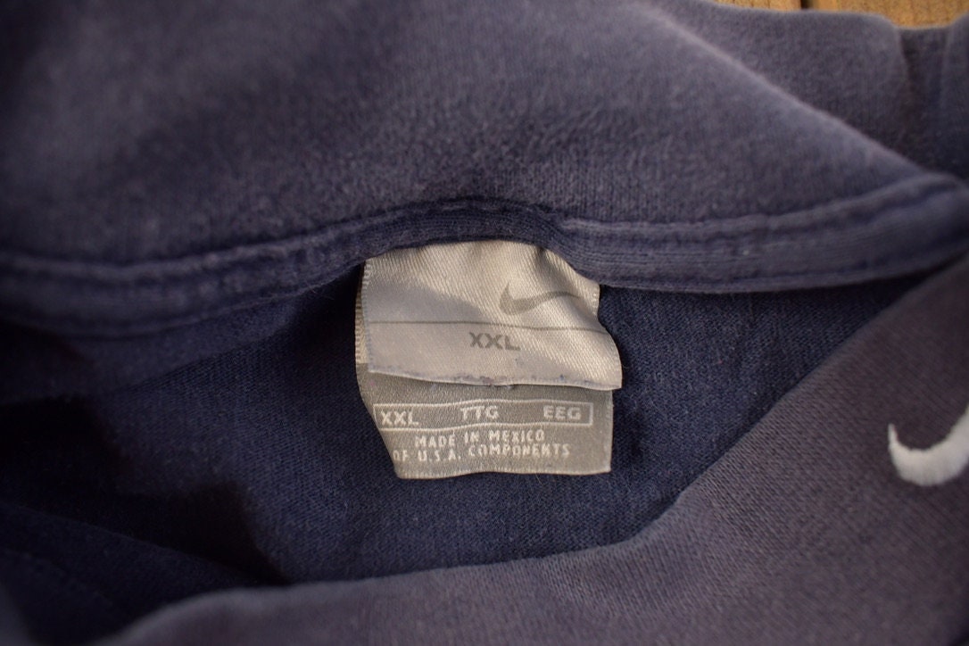 Vintage 1990s Nike Embroidered Mini Swoosh Long Sleeve Sweatshirt