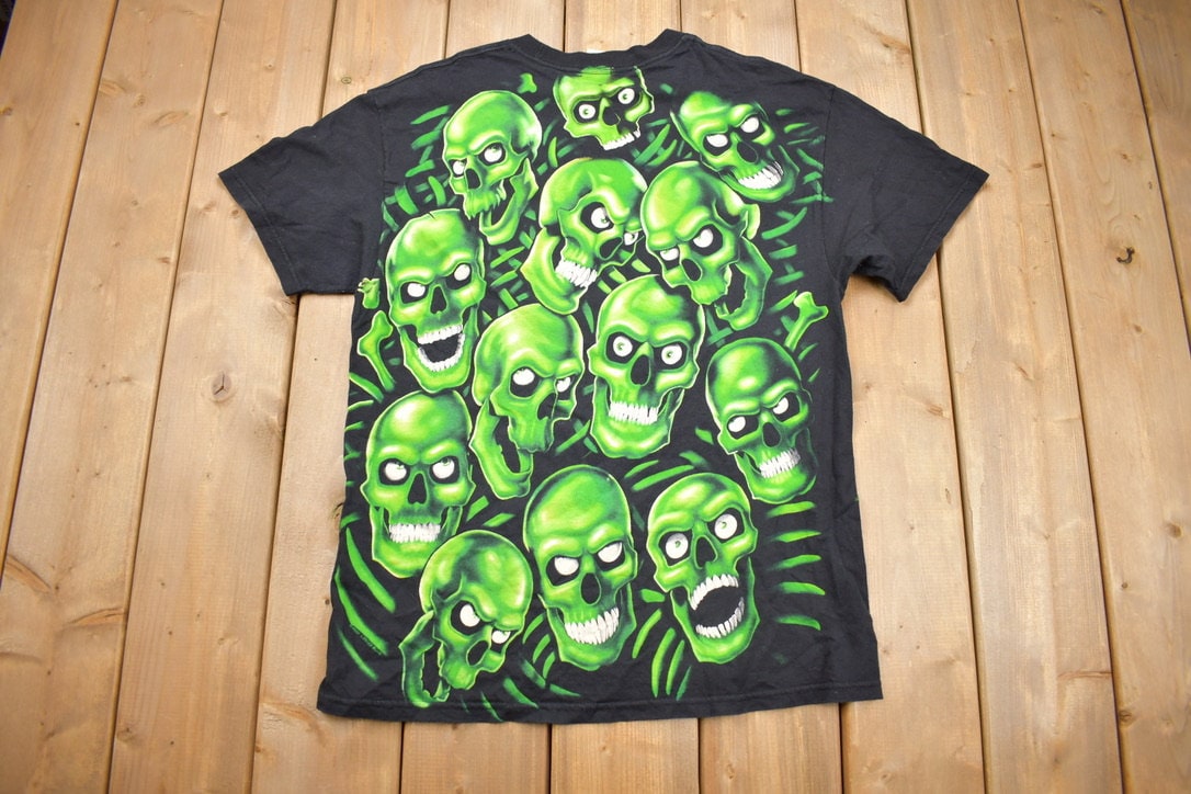 Vintage 2001 Liquid Blue Skull Pile All Over Print T-shirt