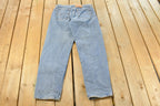 Vintage 1990s Levi's 560 Loose Straight Denim Jeans Women's 32 x 31 / 90s Levi's / Distressed Sun Faded Jeans