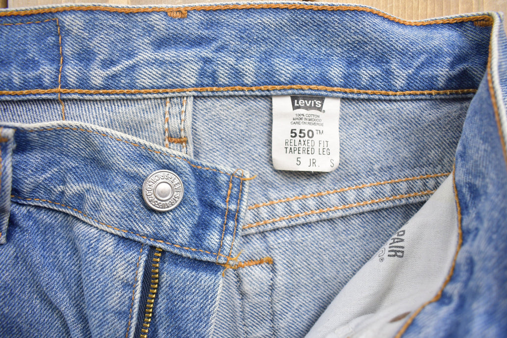 Vintage 1990s Levi's 550 Red Tab Denim Jeans Size 26 x 28