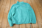 Vintage 1990s The North Face Women's Blue Fleece Sweater