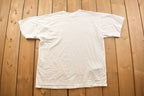Vintage 1990s Flower Baby Themed Graphic T Shirt